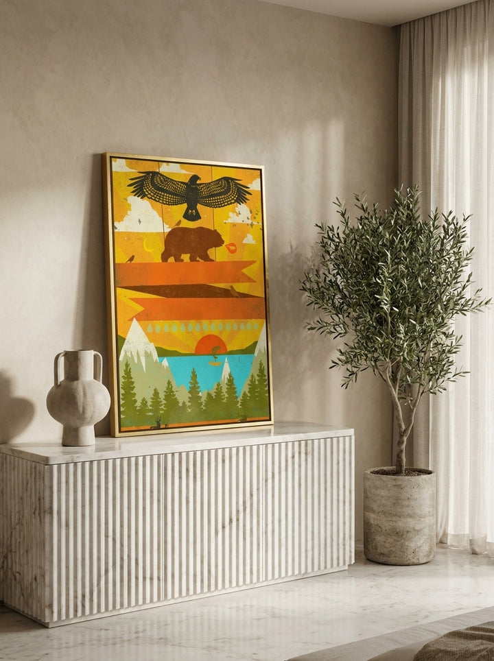 Canvas wall art with a gold leaf surround standing on a sideboard in a luxe bedroom