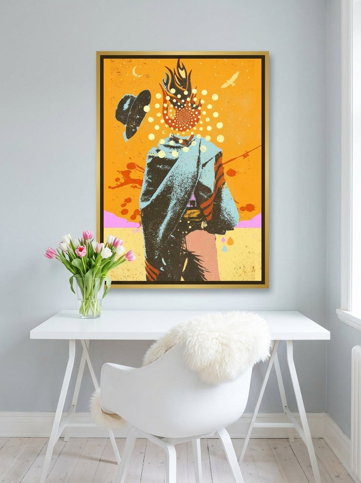Canvas wall art with a gold leaf surround styled on the wall in a bright Scandinavian home office