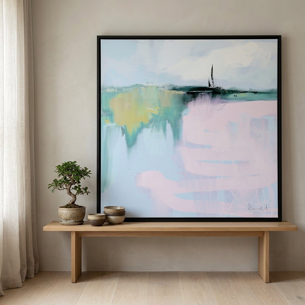 Canvas wall art with a black surround standing on a bench in a warm Japandi home office