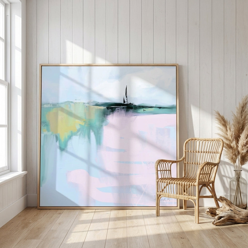 Oversized statement canvas wall art with a natural timber surround leaning against the wall in a coastal bedroom