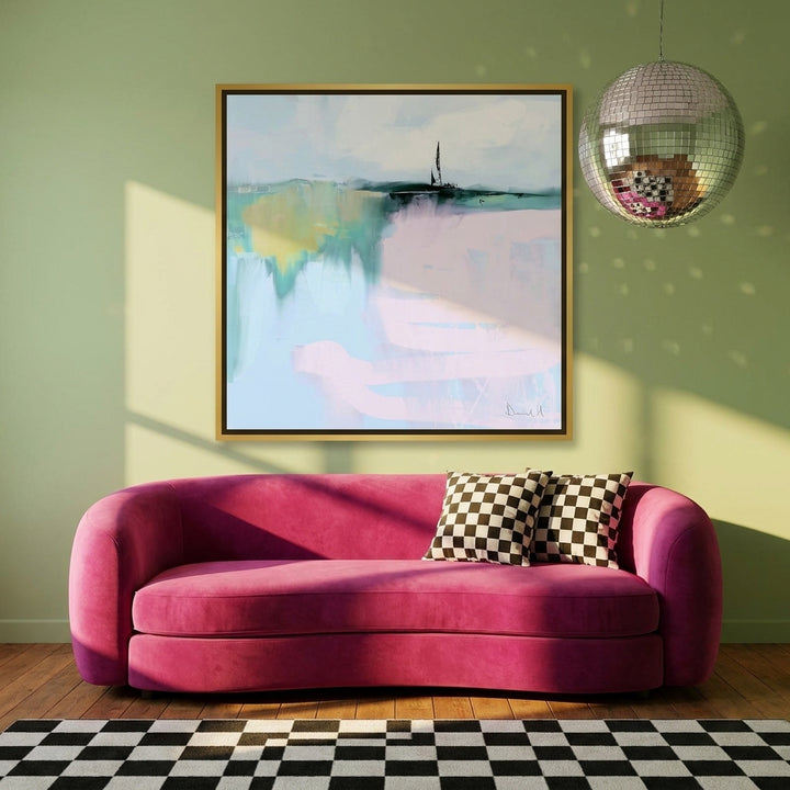 Canvas wall art with a gold leaf surround styled on the wall in a colourful eclectic living room