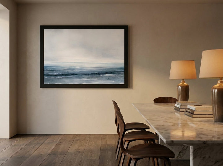 Modern wall art print styled on the wall in a luxe dining room