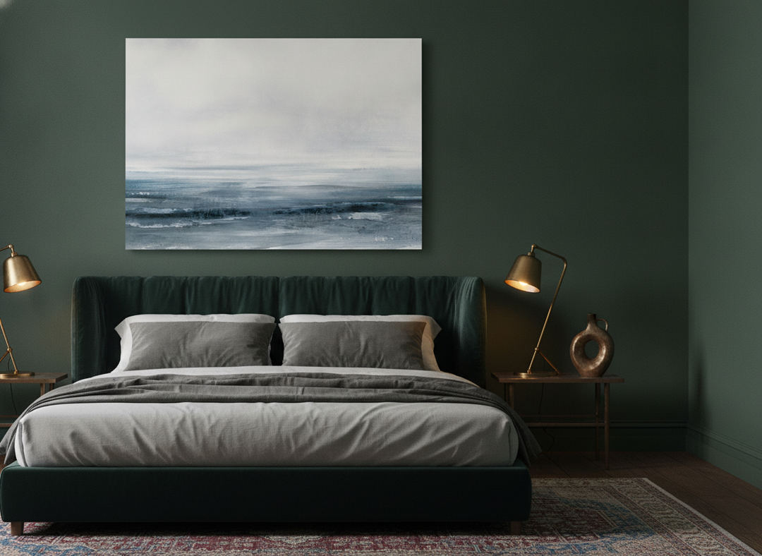 Stretched canvas wall art styled on the wall in a moody bedroom