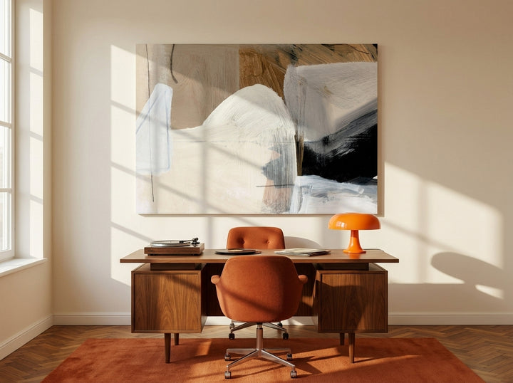 Stretched canvas wall art styled on the wall in a retro 70s home office