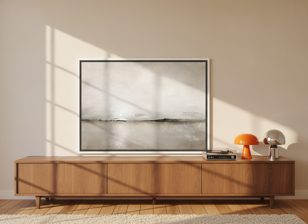 Canvas wall art with a white surround standing on a sideboard in a retro 70s bedroom