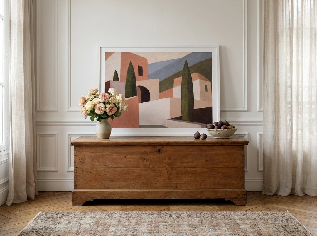 Modern wall art print standing on a sideboard in a Parisian living room