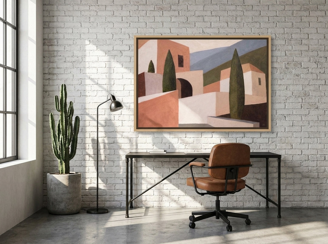Canvas wall art with a natural timber surround styled on the wall in an industrial loft home office