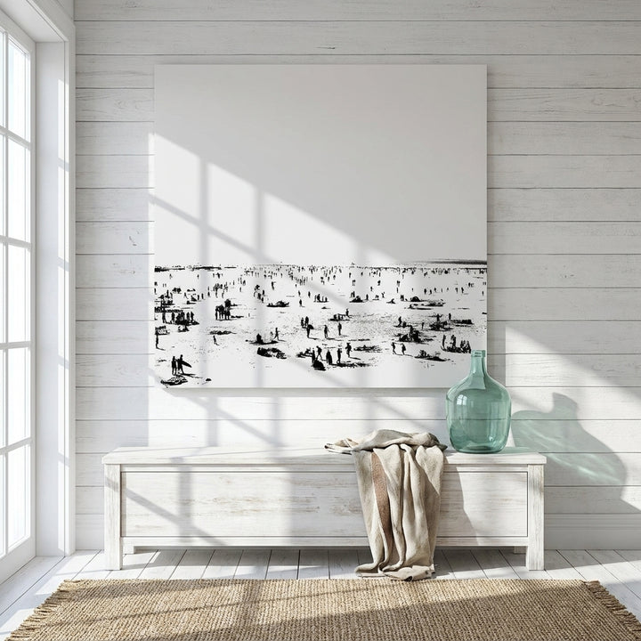 Stretched canvas wall art styled on the wall in a coastal living room
