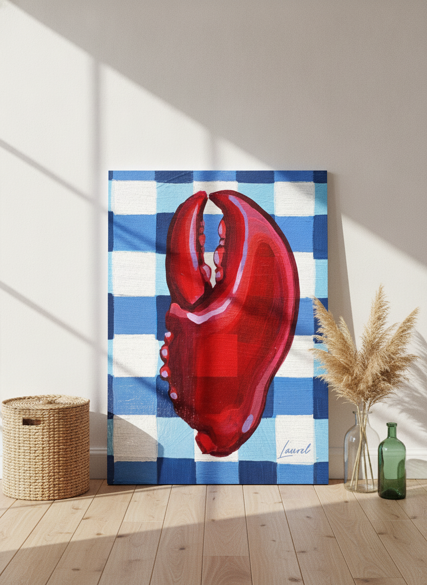 Stretched canvas wall art leaning against the wall in a coastal dining room