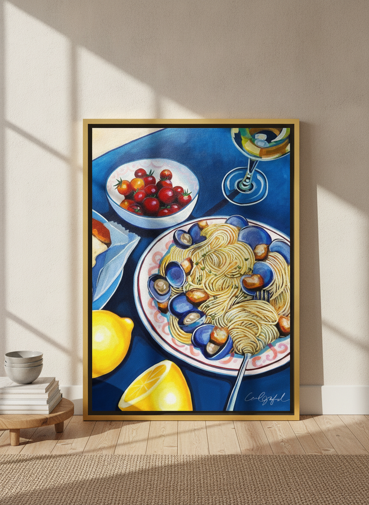 Oversized statement canvas wall art with a gold leaf surround leaning against the wall in a warm Japandi dining room