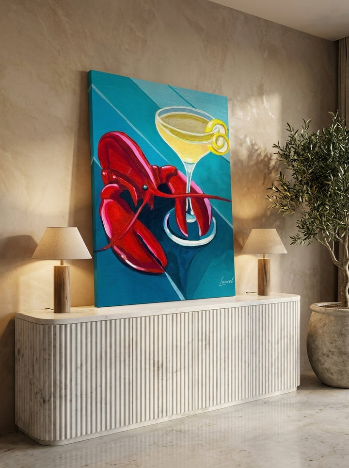 Stretched canvas wall art standing on a sideboard in a luxe living room