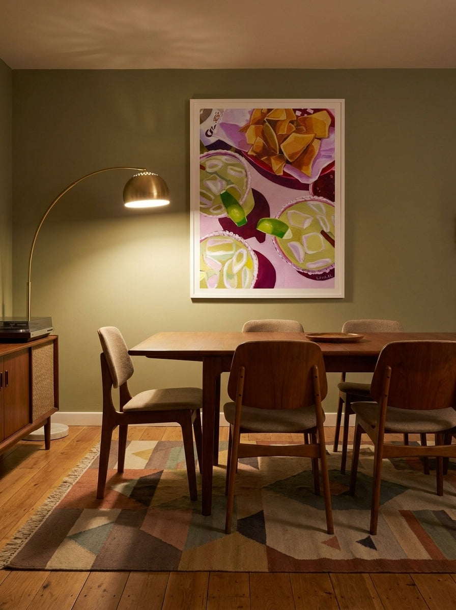 Modern wall art print styled on the wall in a mid-century dining room