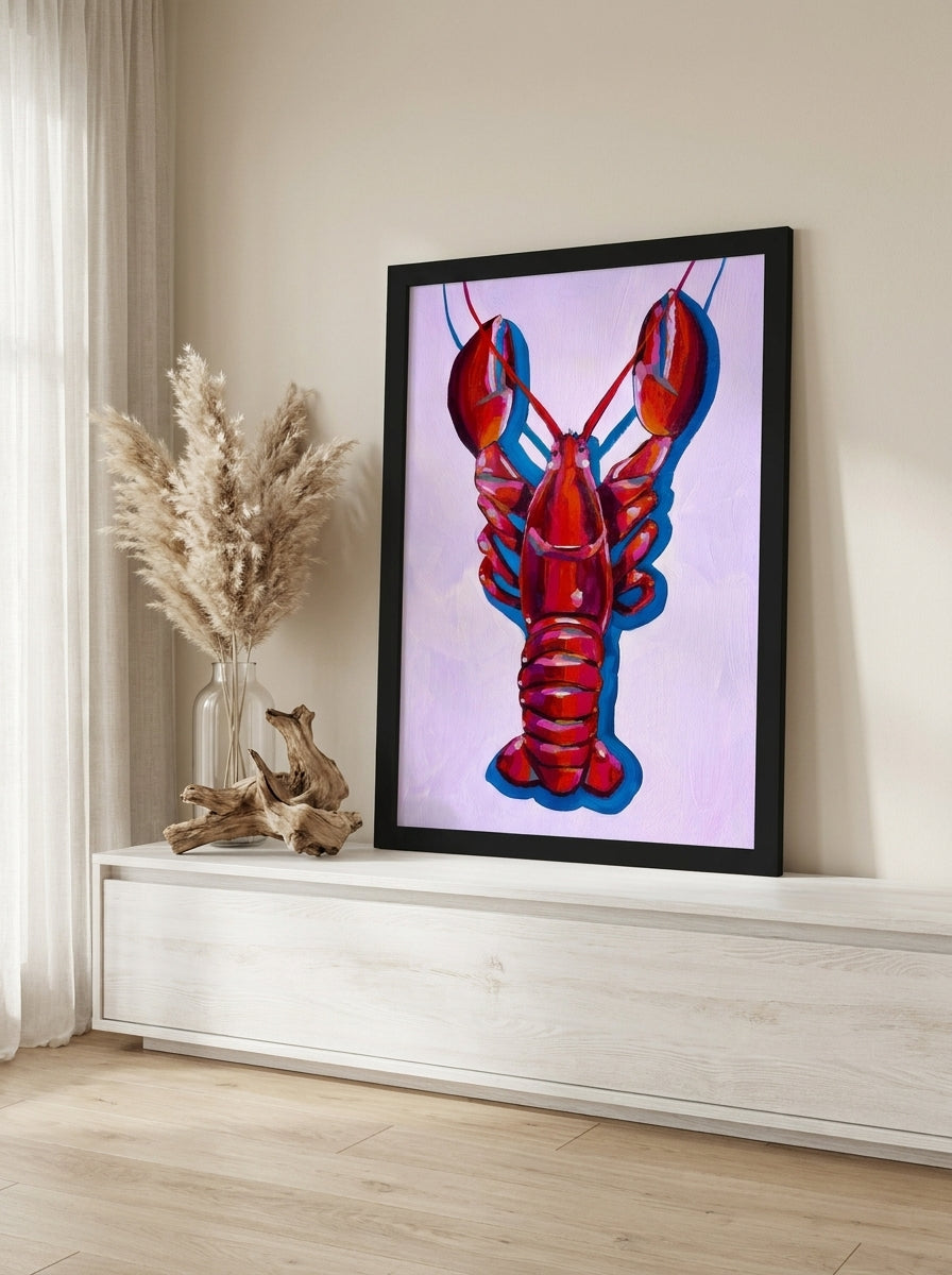 Modern wall art print standing on a console in a coastal bedroom