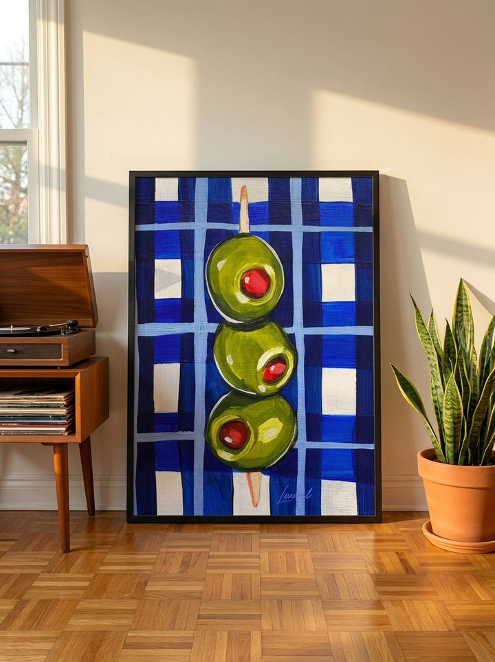 Modern wall art print leaning against the wall in a mid-century kitchen