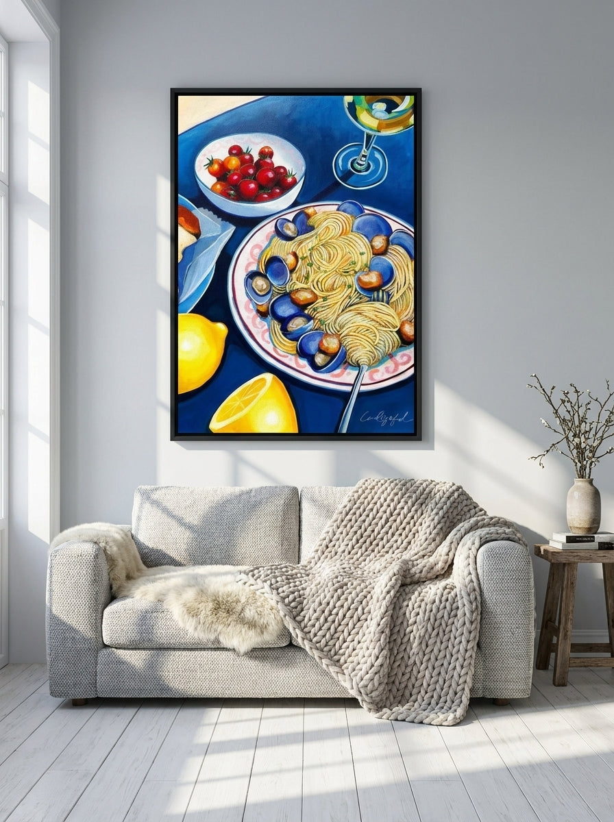 Canvas wall art with a black surround styled on the wall in a bright Scandinavian living room