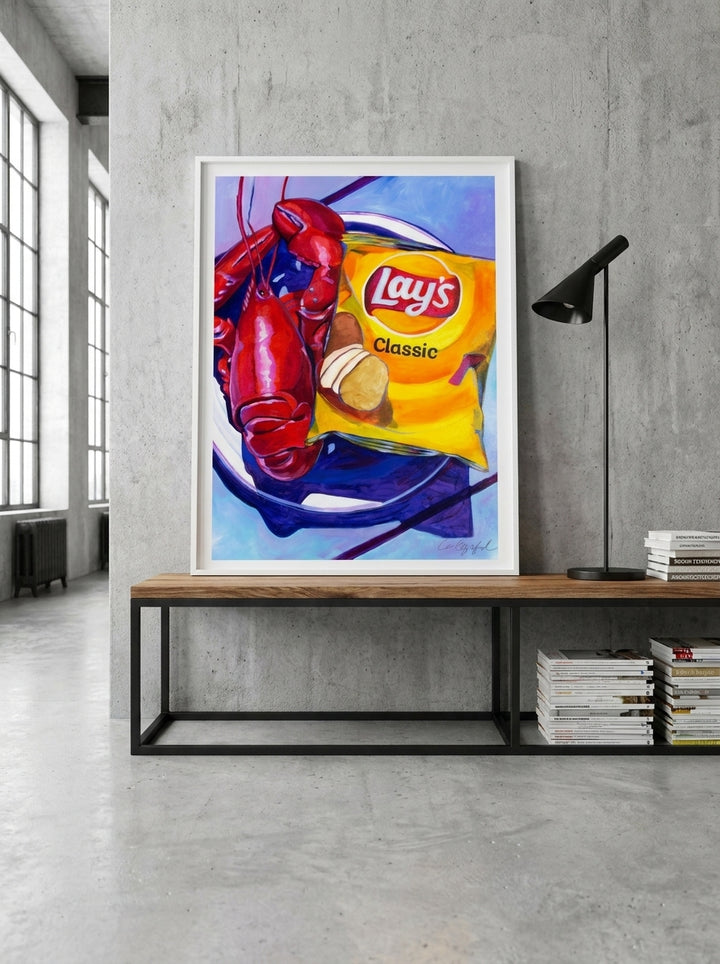 Modern wall art print standing on a console in an industrial loft living room