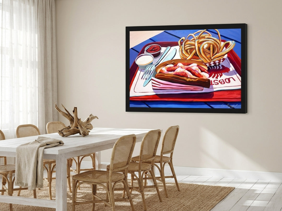 Oversized statement modern wall art print styled on the wall in a coastal dining room