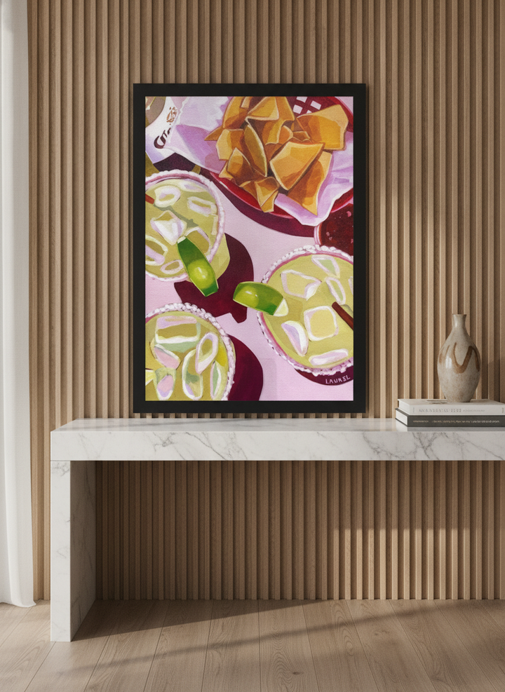Modern wall art print standing on a kitchen bench in a luxe kitchen
