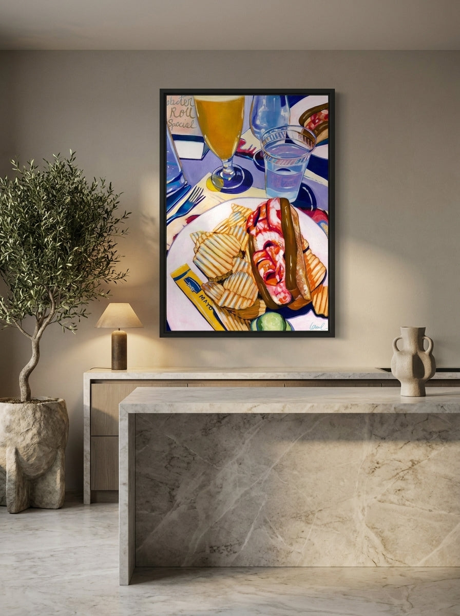 Canvas wall art with a black surround styled on the wall in a luxe kitchen