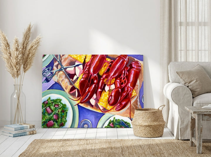 Stretched canvas wall art leaning against the wall in a coastal living room
