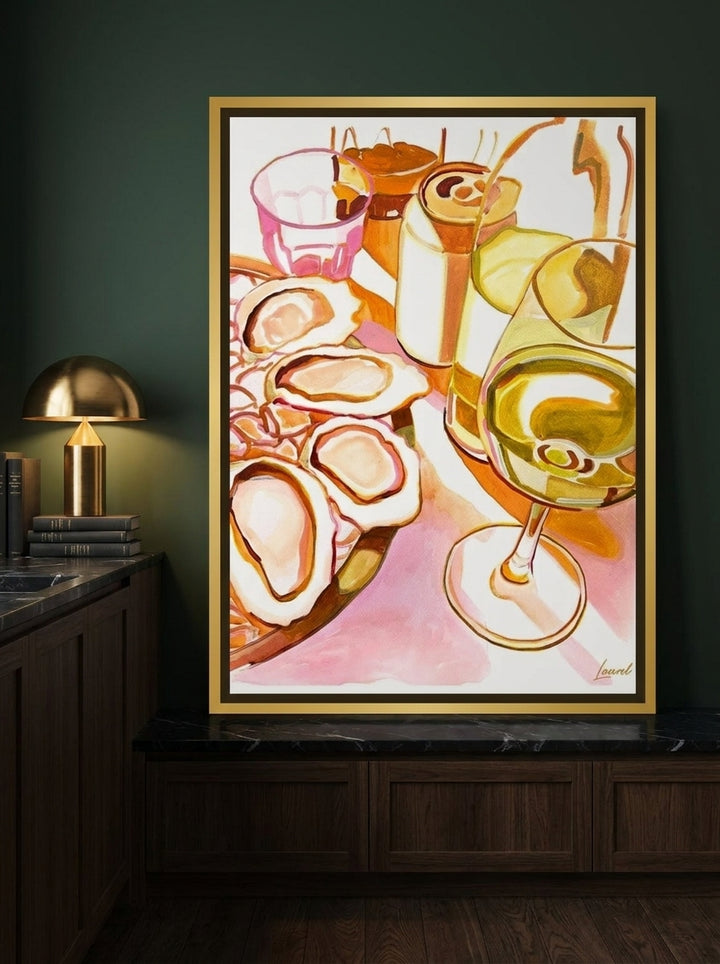 Canvas wall art with a gold leaf surround styled on the wall in a moody kitchen