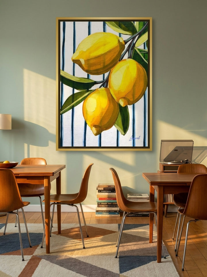 Oversized statement canvas wall art with a gold leaf surround styled on the wall in a mid-century dining room