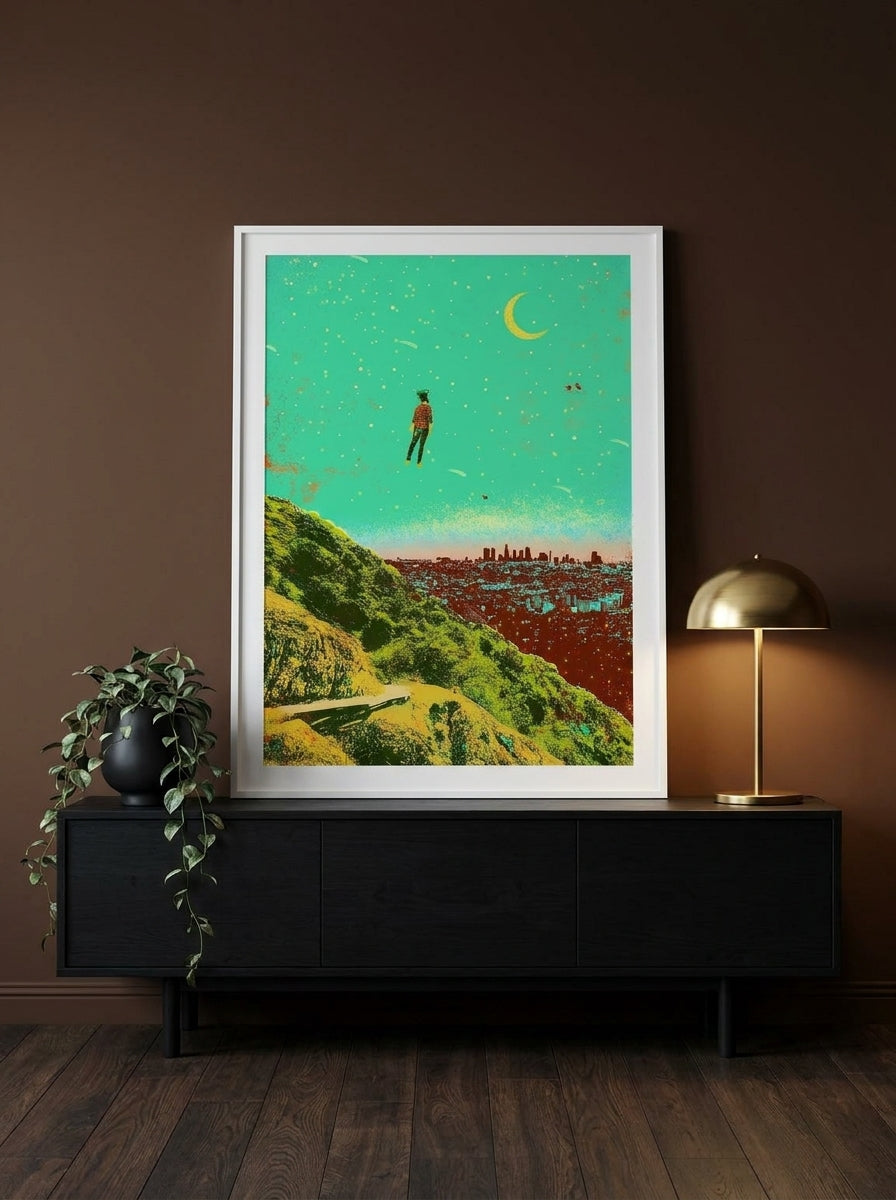 Modern wall art print standing on a console in a moody living room