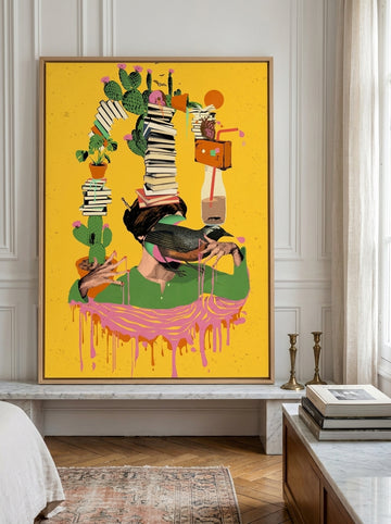 Canvas wall art with a natural timber surround standing on a console in a Parisian bedroom