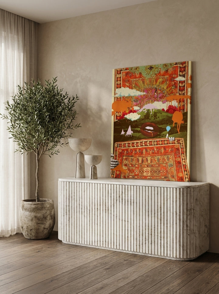Stretched canvas wall art standing on a sideboard in a luxe home office