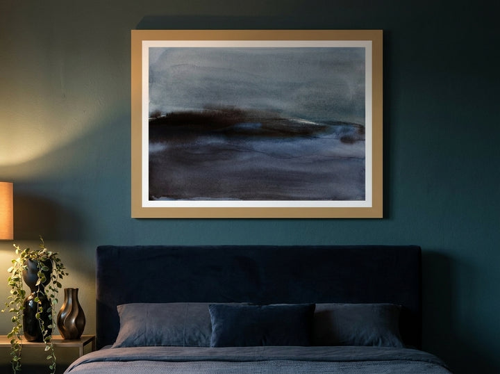 Modern wall art print styled on the wall in a moody bedroom