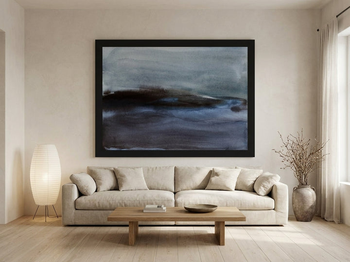 Oversized statement modern wall art print styled on the wall in a warm Japandi living room
