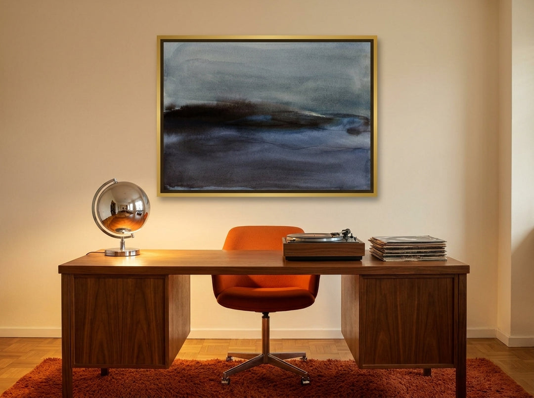 Canvas wall art with a gold leaf surround styled on the wall in a retro 70s home office
