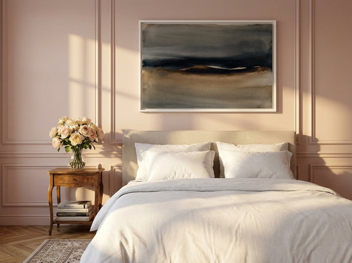 Canvas wall art with a white surround styled on the wall in a Parisian bedroom