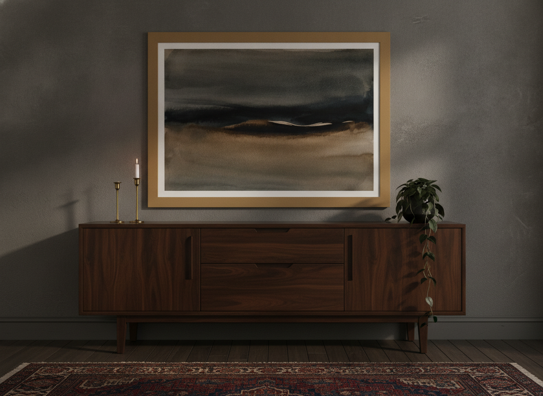 Modern wall art print styled on the wall in a moody living room