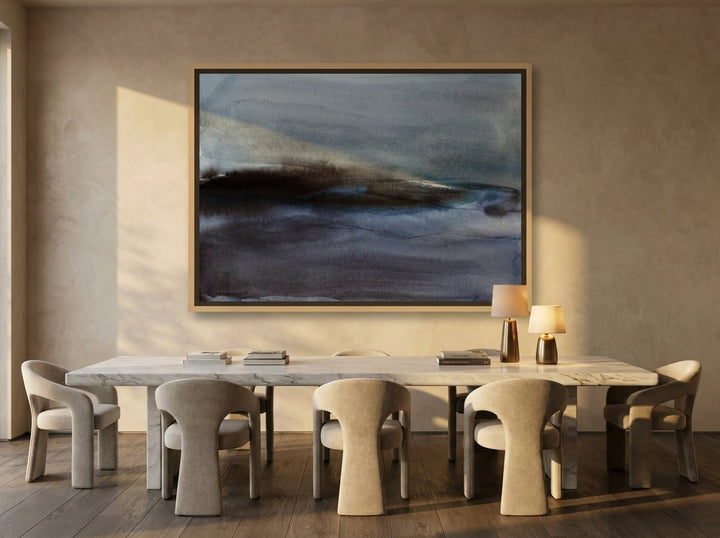 Oversized statement canvas wall art with a natural timber surround styled on the wall in a luxe dining room