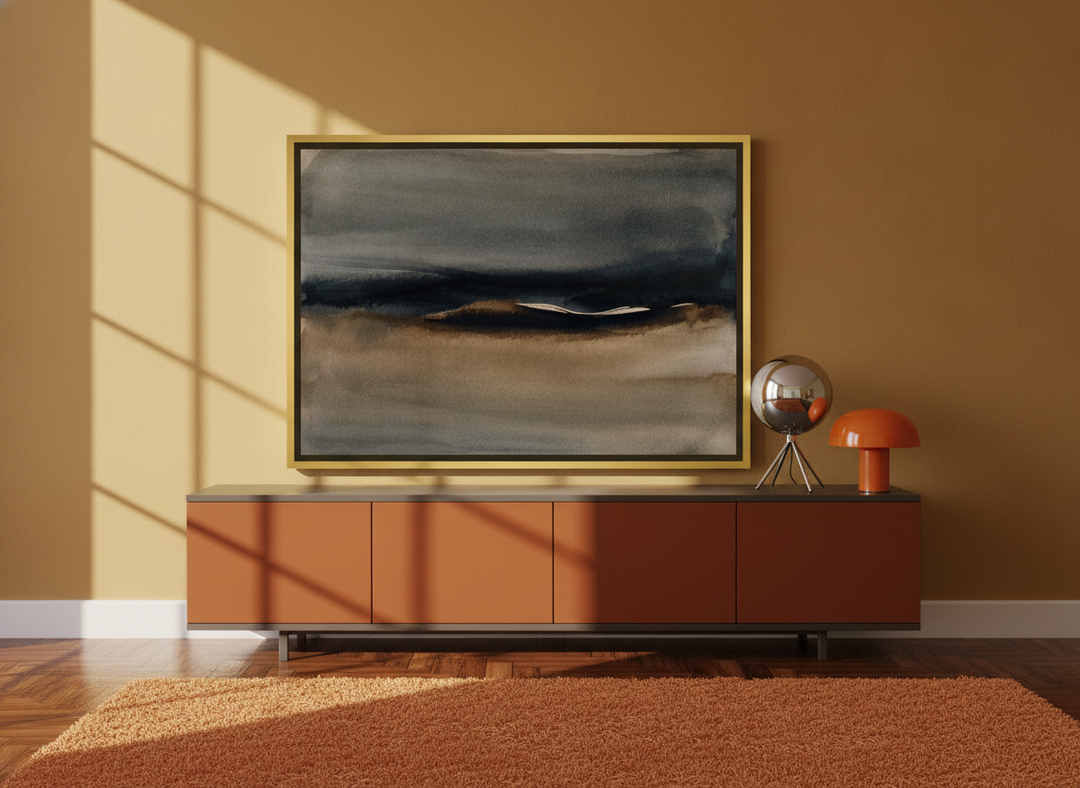 Canvas wall art with a gold leaf surround standing on a sideboard in a retro 70s home office
