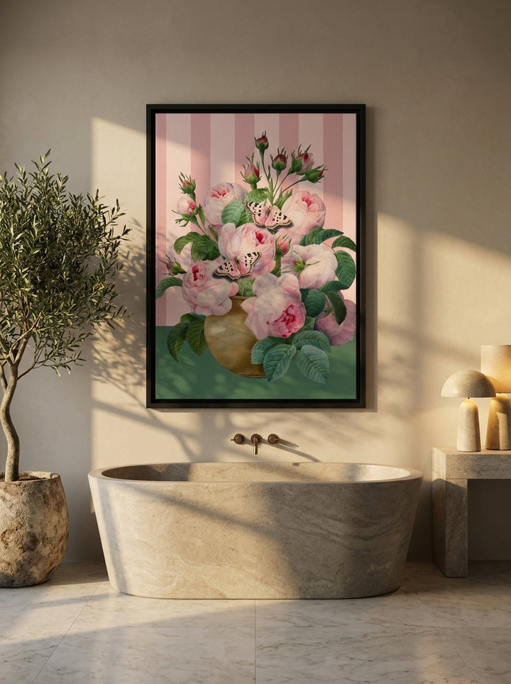 Canvas wall art with a black surround styled on the wall in a luxe bathroom