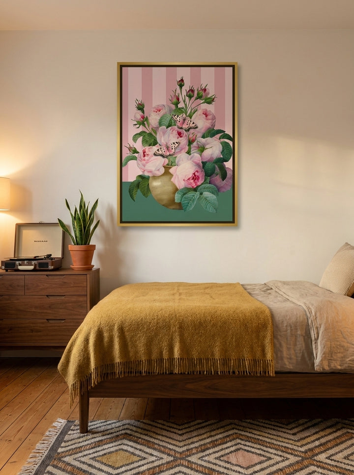 Canvas wall art with a gold leaf surround styled on the wall in a mid-century bedroom