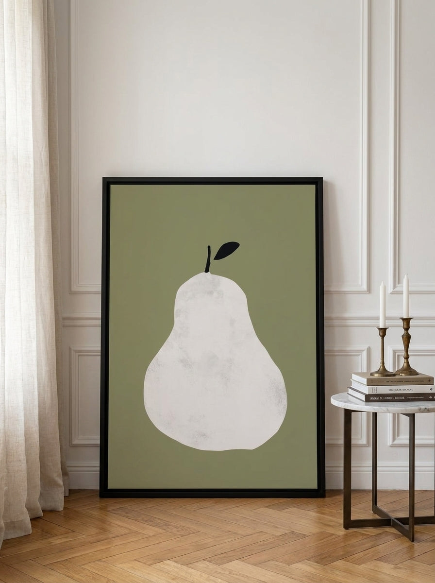 Canvas wall art with a black surround leaning against the wall in a Parisian kitchen