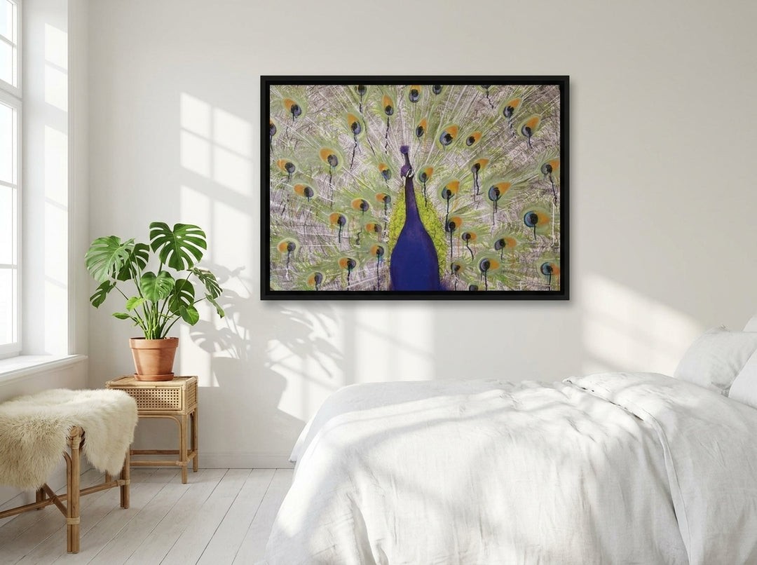 Canvas wall art with a black surround styled on the wall in a bright Scandinavian bedroom