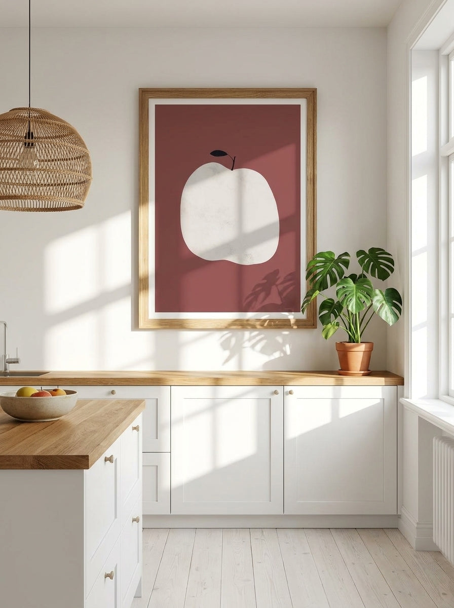 Modern wall art print styled on the wall in a bright Scandinavian kitchen