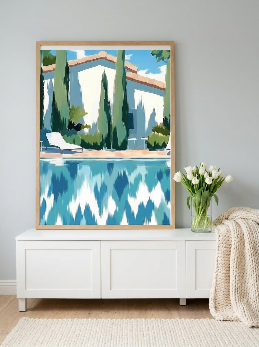 Modern wall art print standing on a sideboard in a bright Scandinavian bathroom