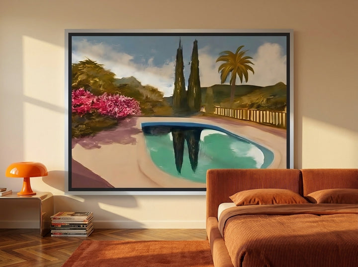 Canvas wall art with a silver leaf surround styled on the wall in a retro 70s bedroom