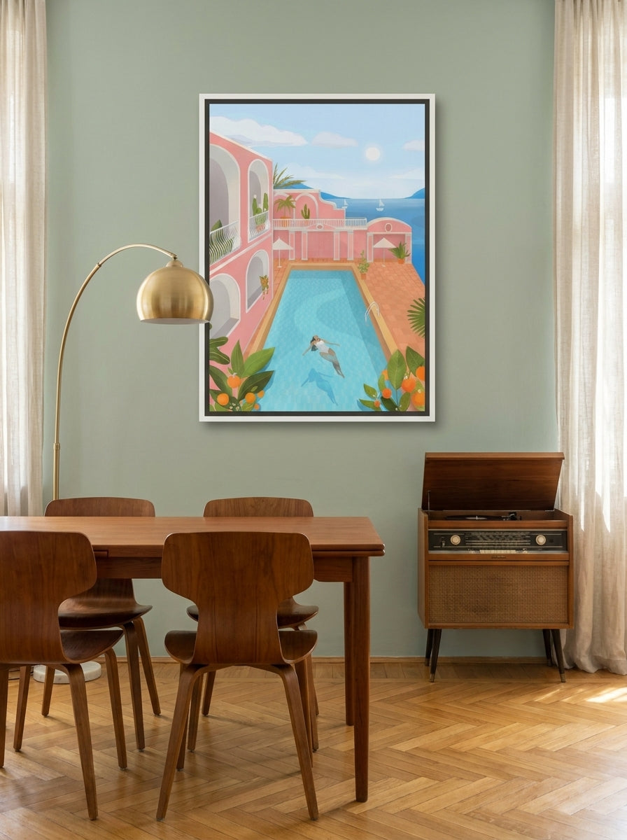 Canvas wall art with a white surround styled on the wall in a mid-century dining room