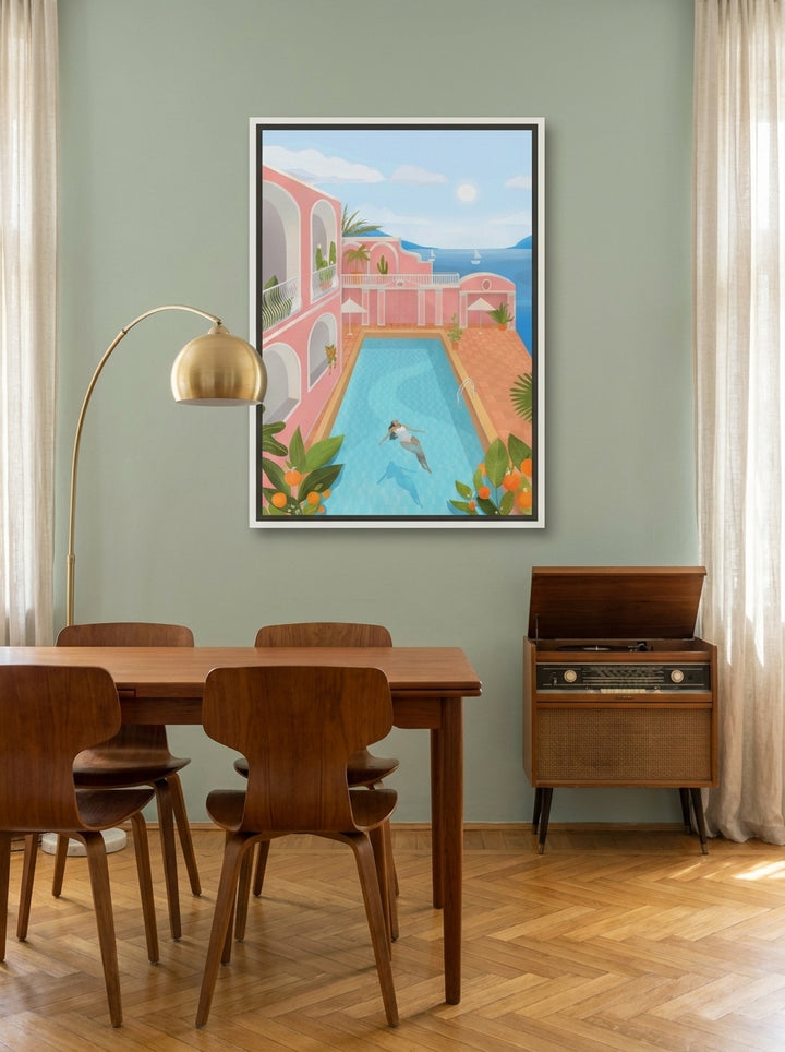 Canvas wall art with a white surround styled on the wall in a mid-century dining room