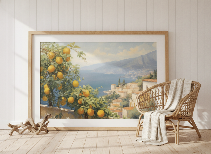Oversized statement modern wall art print leaning against the wall in a coastal bedroom