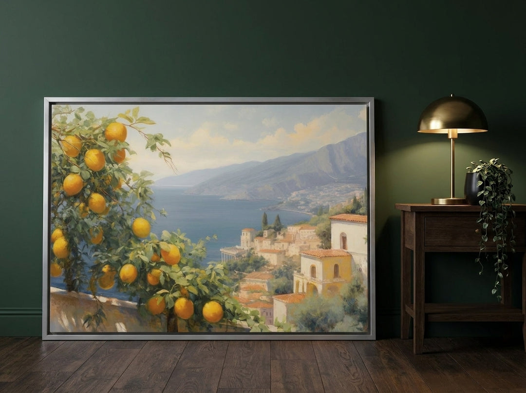 Canvas wall art with a silver leaf surround leaning against the wall in a moody living room