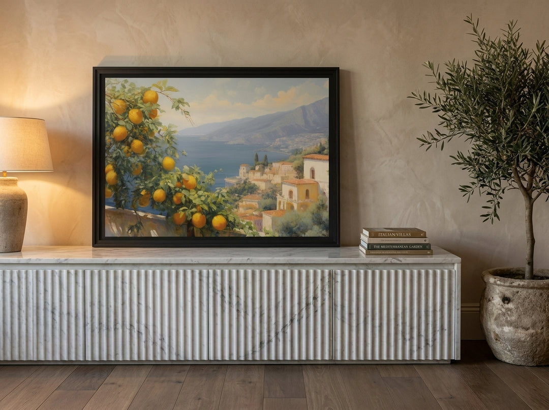 Modern wall art print standing on a sideboard in a luxe bedroom