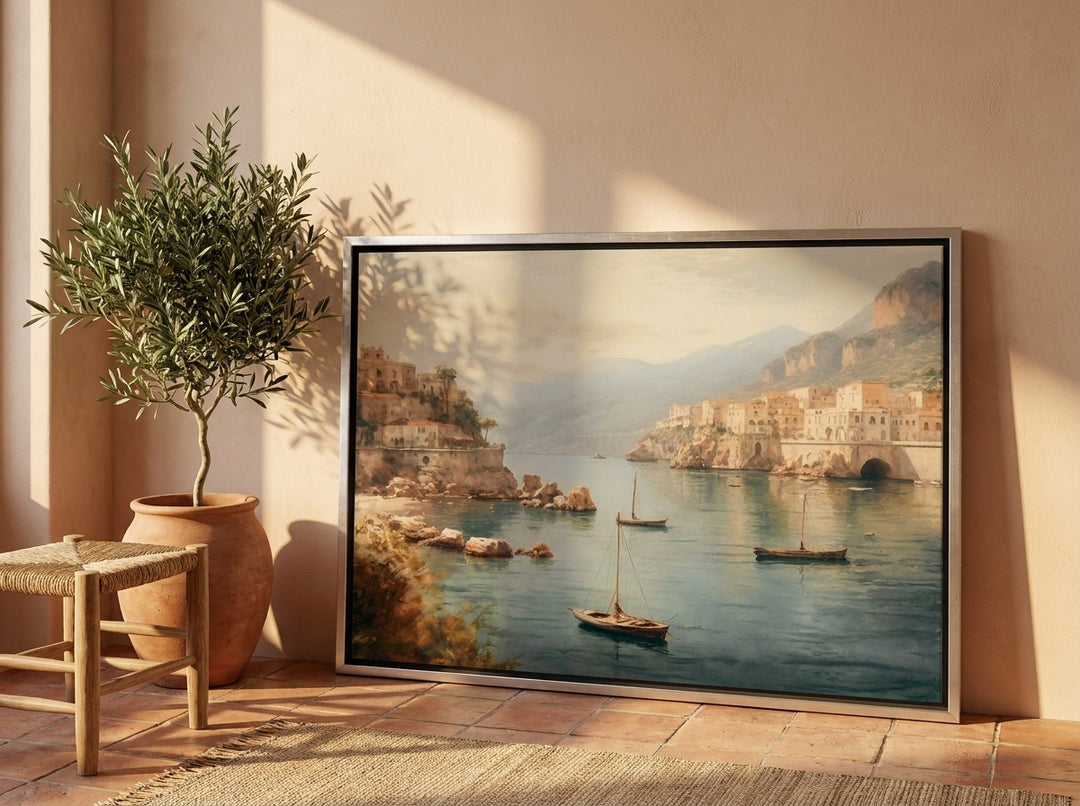 Canvas wall art with a silver leaf surround leaning against the wall in a Mediterranean bedroom