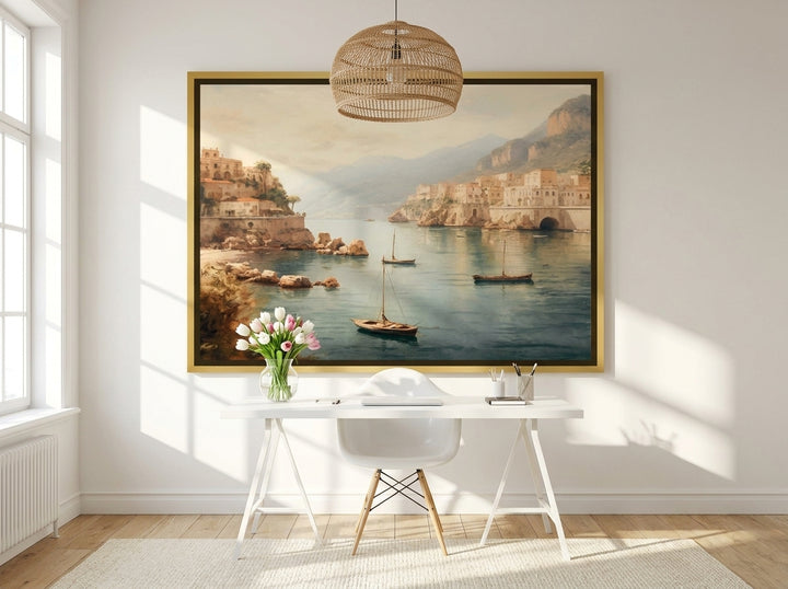 Oversized statement canvas wall art with a gold leaf surround styled on the wall in a bright Scandinavian home office